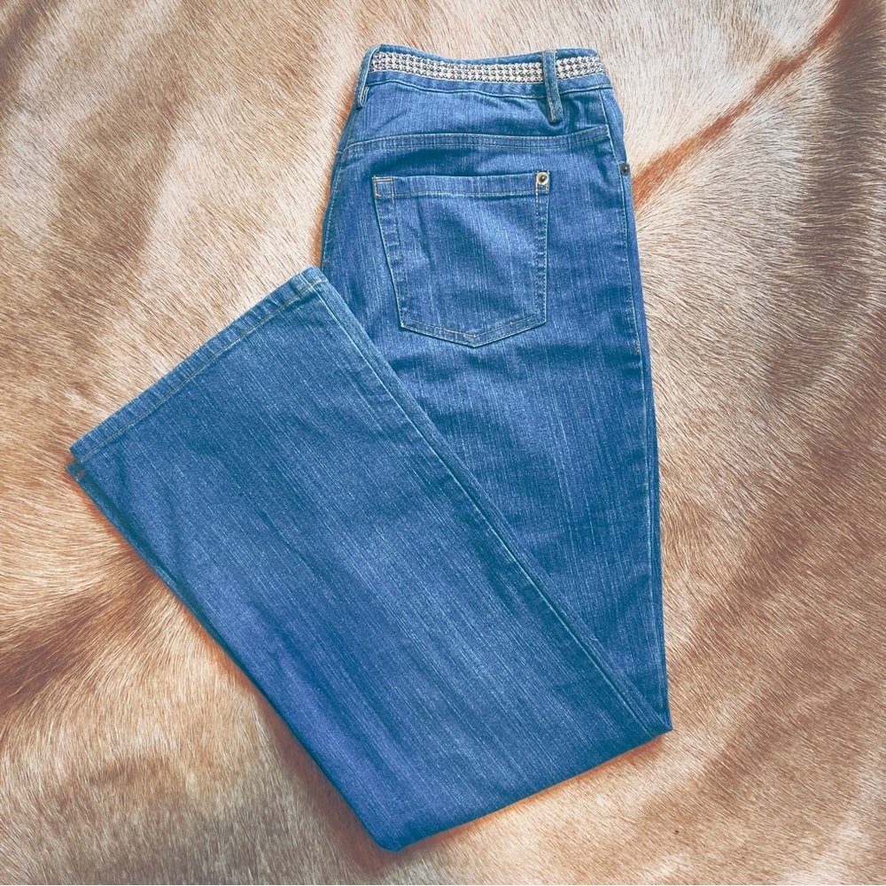 INC International Concepts petite jeans with an attached ghinstone at the waist.